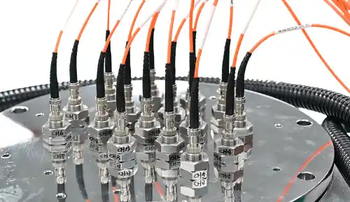 Fiber Optic Temperature Measurement System for Temperature Monitoring of Oil Immersed Transformers